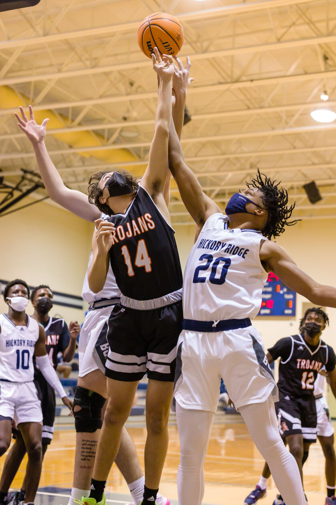 Boys Basketball: Hickory Ridge RaginÕ Bulls defeated the Northwest Cabarrus Trojans 64-56.